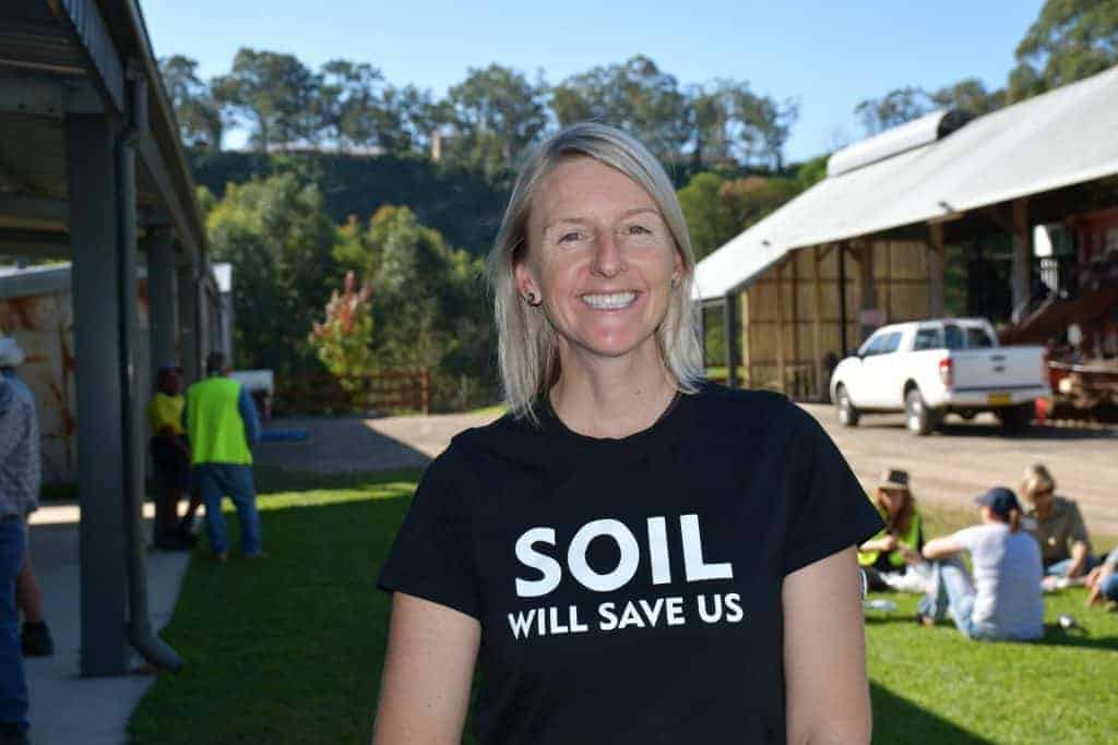Soil science advocate at Soil Science Australia event outdoors in natural environment.